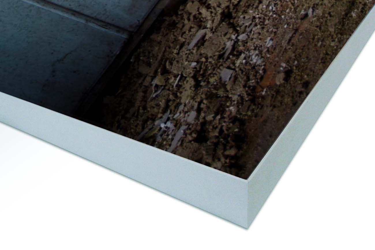 Close up textieldoek gemonteerd in frame zilver