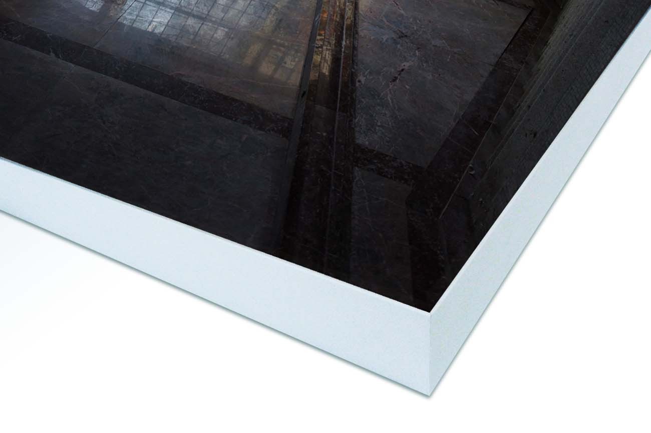 Close up textieldoek gemonteerd in frame wit